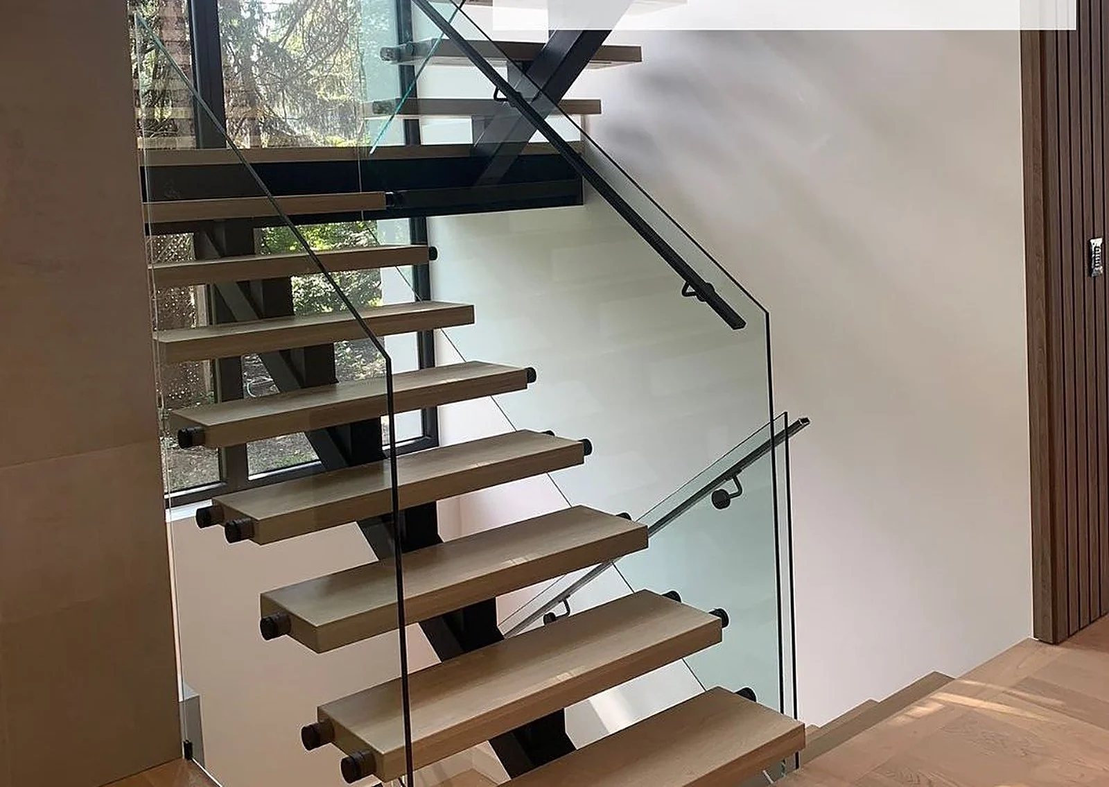 Floating staircase finished for Rymes Fine Homes