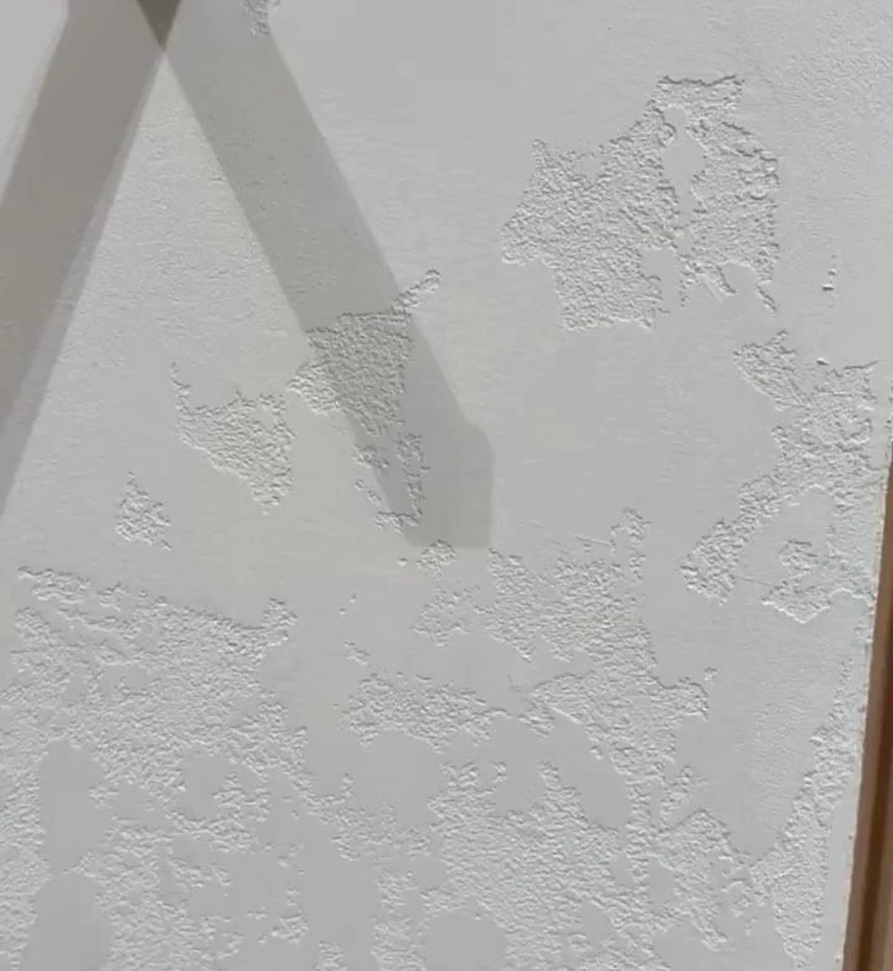 Close-up of a hand-applied stone-look paint finish